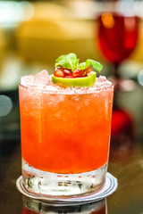 pomegranate cocktail with mint lime and pomegranate seeds