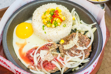 Japanese Curry Hamburger and Beef Slice on hot plate