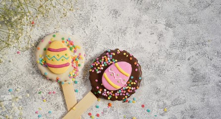 Easter spring background with decorated frosted cookies, selective focus