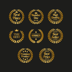 Naklejka premium Set of golden laurel wreaths on black background.