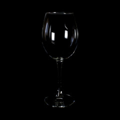 Glass of tasty wine on white background
