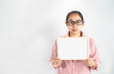 Serious face Asian woman holding blank white board for copy placed isolated on a white background.