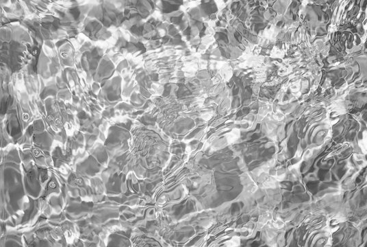 Liquid silver glitter background texture. Abstract gray pattern
