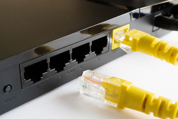 one cable is inserted into the router the second lies next to the router