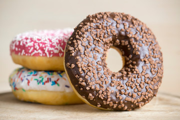 Colorful sweet donut cakes - junk food concept