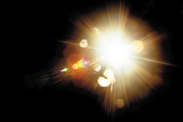 Lens Flare. Light over black background. Easy to add overlay or screen filter over photos. Abstract...