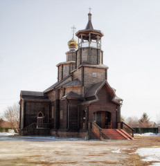 Pokrovsky church in Ust-Kamenogorsk. Christian architecture. Wooden church. Religious building.