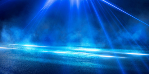 Background of the room with concrete pavement. Blue and pink neon light. Smoke, fog, wet asphalt with reflection of lights. Abstract light, searchlight rays. Night view of the street with lights, dark