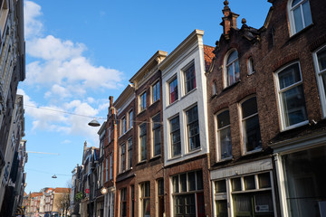 Obraz premium Dordrecht city - typical facade and buildings with blue sky - Netherlands - Holland.