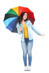 Young girl with colorful umbrella isolated on white background