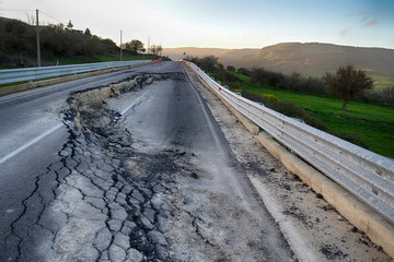 Damaged asphalt road _ Road landslide _ rough road 