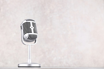 Fototapeta premium Vintage microphone on grey background
