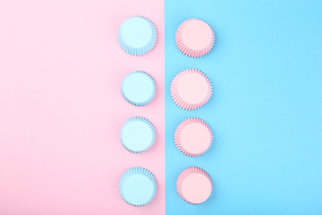 Cupcake cases on colorful background