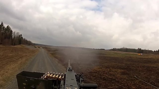 Military armored vehicle driving and firing 2