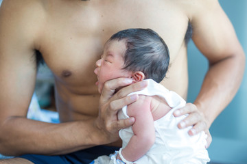 Infant baby boy belching after drink breast milk