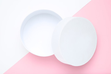 Open white gift box on colorful background