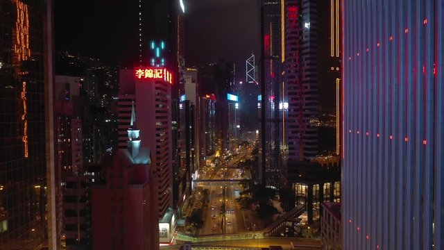 night illuminated flight over hong kong city traffic street bay aerial panorama 4k 