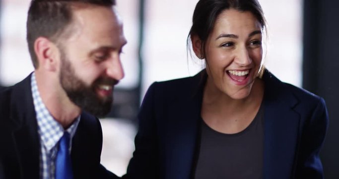4K Close up excited couple having a meeting with unseen financial adviser. Slow motion.