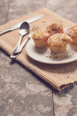 muffins with sugary chips and coffee