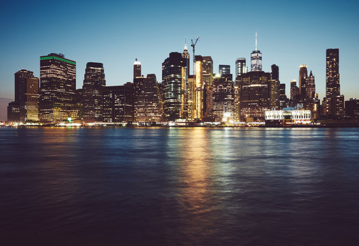 Manhattan at blue hour, color toned picture, New York City, USA.
