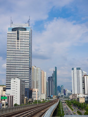 Fototapeta na wymiar Modern city building with railway of train in Bangkok