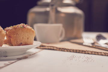 muffins with sugary chips and coffee