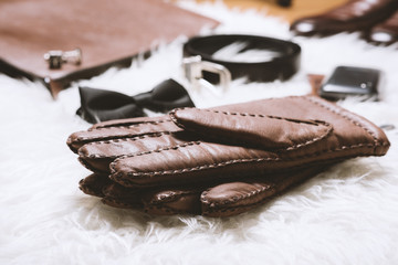 brown leather gloves