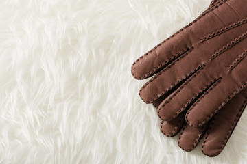 brown leather gloves