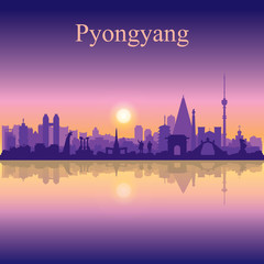 Obraz premium Pyongyang city silhouette on sunset background