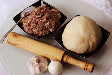 Russian dumplings, modeling of dough and meat.