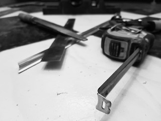 Repair - building with tools, tape measure, metal scissors, file, metal knife, pencil, knife, ruler