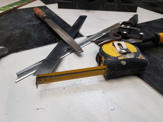 Repair - building with tools, tape measure, metal scissors, file, metal knife, pencil, knife, ruler