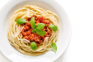 Spaghetti Bolognese with cheese and basil