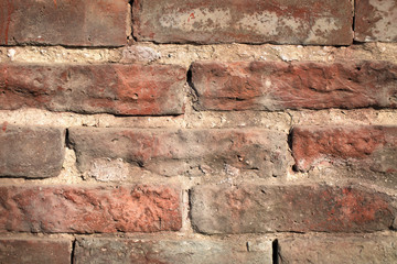 Ancient Brick wall texture, ramshackle closeup