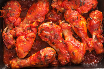 Chicken drumsticks with hot tomato barbecue sauce