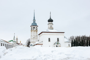 White stone church on the central square of Suzdal in winter
