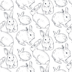Vector seamless pattern with hand drawn rabbits.