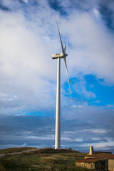 Fototapeta na wymiar Wind turbine field on the hill for renewable energy source