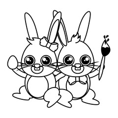 beautiful rabbits couple with egg and paintbrush