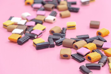 Liquorice Candy on a pink  background