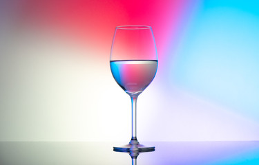 wine glasses dishes on a colored background