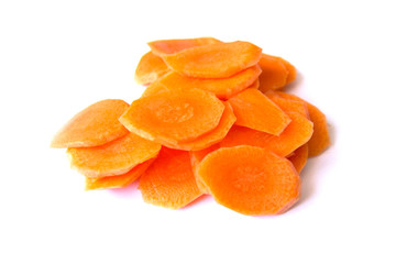 Naklejka na ściany i meble Fresh carrot sliced into thin slices on a white background