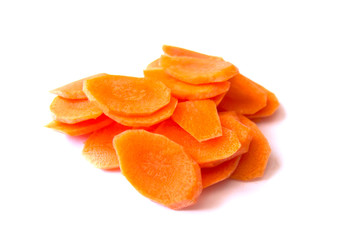 Fresh carrot sliced into thin slices on a white background