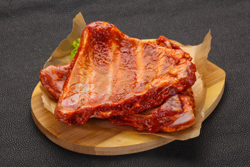 Raw marinated pork ribs