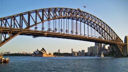 Fototapeta premium The beautiful view of The Sydney Opera House and the Harbour Bridge in the Harbour of The Beautiful city in Australia