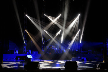 scene, stage light with colored spotlights and smoke