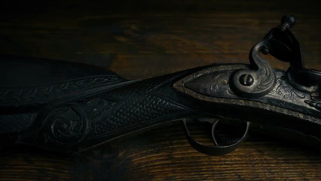 Old Musket Gun On Wooden Table