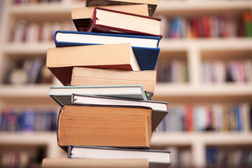 Stack books on library background