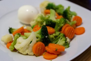Cooked colorful vegetables with eggs on the plate. Slovakia