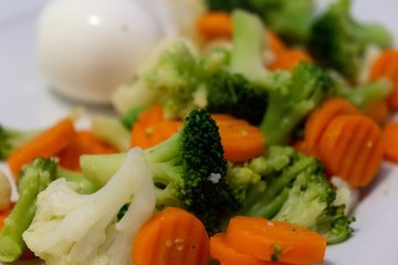 Cooked colorful vegetables with eggs on the plate. Slovakia